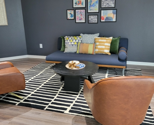 coffee table, a couch and chairs at Lynhurst Park Apartments